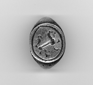 Gold ring found by archaeologists near Buxton on Hatteras Island in 2005, bearing markings that date to the late 1580s. Englishmen searching for the Lost Colony are known to have been in the region at that time. Courtesy of Professor David Phelps, East Carolina University. Gold ring found by archaeologists near Buxton on Hatteras Island in 2005, bearing markings that date to the late 1580s. Englishmen searching for the Lost Colony are known to have been in the region at that time. Courtesy of Professor David Phelps, East Carolina University.