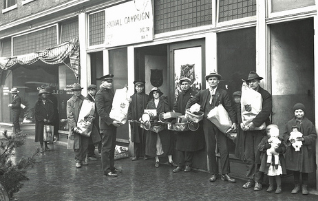 Salvation Army Christmas Package Distribution, Greensboro, NC, c.1930-1939. From the Charles A. Farrell Photo Collection, North Carolina State Archives, call #: PhC9_1_80, Raleigh, NC. Salvation Army Christmas Package Distribution, Greensboro, NC, c.1930-1939. From the Charles A. Farrell Photo Collection, North Carolina State Archives, call #: PhC9_1_80, Raleigh, NC.
