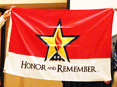 The Honor and Remember Flag at a ceremony at the National Congress of the Sons of the American Revolution in Phoenix, Arizona on July 9, 2012. Image from Picasa user George Lutz.