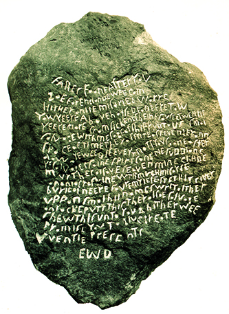 Dare stone is oval with words carved into the back side. 