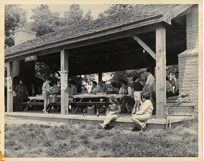 Photograph of a picnic shelter at Kerr Lake, ca. 1950s. The picnic shelters are a popular rental at the recreation area for families, reunions, and social events. From the North Carolina Division of Parks and Recreation.