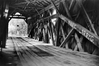 Skeen Mill Bridge in Randolph County, ca. 1970s. The bridge is no longer standing. Photograph by Jerry Cotten. North Carolina Collection, University of North Carolina at Chapel Hill Library.