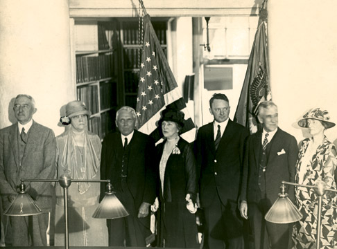  President Edwin A. Alderman, Mrs. Bessie Alderman, Secretary of State Frank B. Kellogg and Mrs. Kellogg, Governor Harry Flood Byrd, Dean Charles G. Maphis, and Mrs. Maphis. Photo by Frank Mitchell." Courtesy of UVA Special Collections.