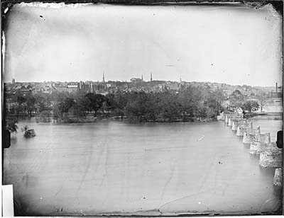 Photograph of the skyline of Richmond, VA, 1860-1865 by Matthew Brady. By 1860, Richmond was an industrial center with a population of 37,000. By contrast, in 1860 Wilmington, one of North Carolina's largest cities, had a population of 9,500 and Charlotte a population of 2,200. Boston, a northern city, had a population of nearly 178,000. North Carolina was still a very rural state of many small farms. Image from the collection of the National Archives.
