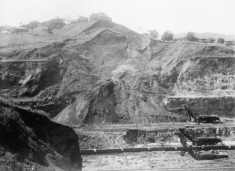 A construction site of mountains and surrounding houses