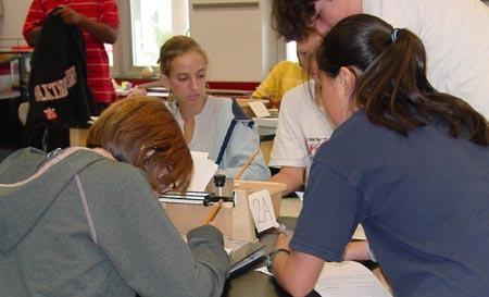 <img typeof="foaf:Image" src="http://statelibrarync.org/learnnc/sites/default/files/images/Students2A.jpg" width="450" height="273" alt="Students staying on task" title="Students staying on task" />