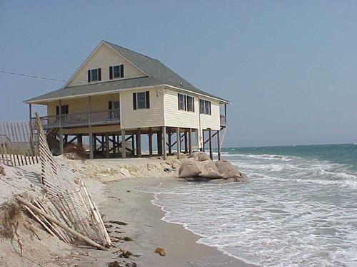 <img typeof="foaf:Image" src="http://statelibrarync.org/learnnc/sites/default/files/images/beach_house.jpg" width="500" height="375" alt="Beachfront house" title="Beachfront house" />