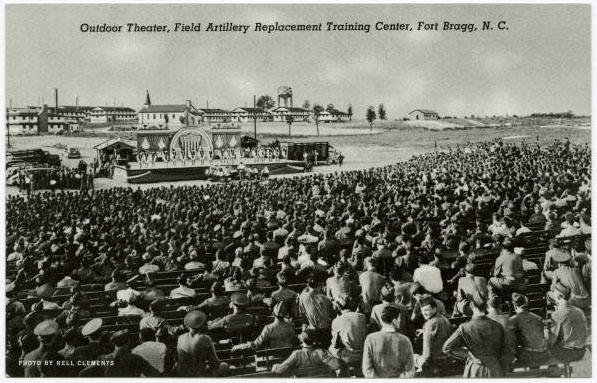 Postcard from Fort Bragg, North Carolina A postcard depicting hundreds of soldiers at an amphitheater.