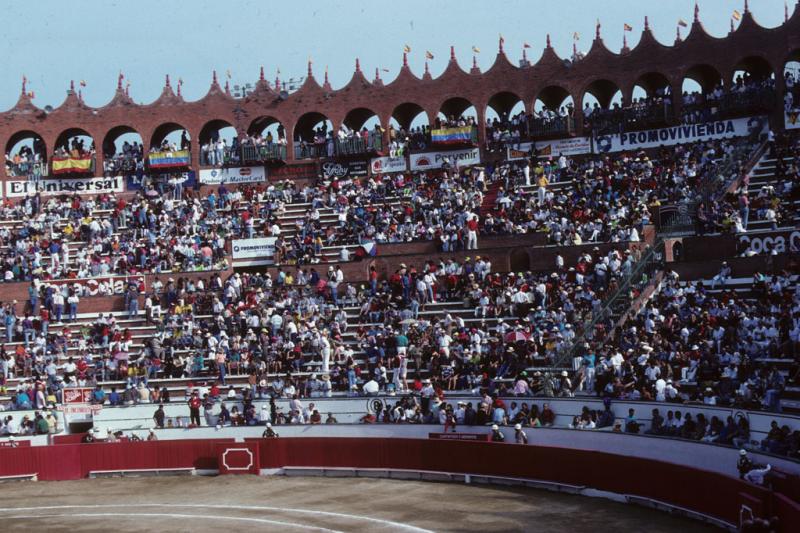 <img typeof="foaf:Image" src="http://statelibrarync.org/learnnc/sites/default/files/images/ecuador_060.jpg" width="1024" height="682" alt="Spectators at a bullfight in Cartagena, Colombia " title="Spectators at a bullfight in Cartagena, Colombia " />