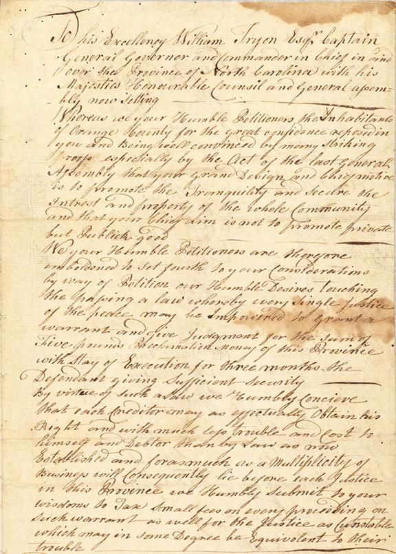 Image of the original petition of Orange County to Governor Tryon, May 1768.  In the petition, the signers apologize for recent acts of violence by Regulators and ask the Governor to address the illegal fees demanded by court officials.  The original petition is located in the collection of the State Archives of N.C.