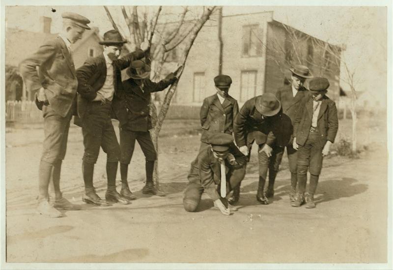 <img typeof="foaf:Image" src="http://statelibrarync.org/learnnc/sites/default/files/images/marbles_1.jpg" width="1024" height="703" alt="Boys playing a game of marbles" title="Boys playing a game of marbles" />