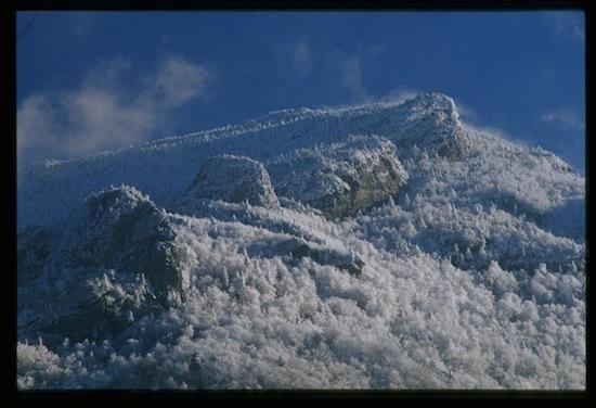 A mountaintop covered in snow and ice.