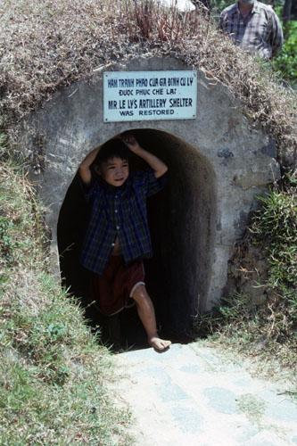 <img typeof="foaf:Image" src="http://statelibrarync.org/learnnc/sites/default/files/images/vietnam_121.jpg" width="333" height="500" alt="Small boy stands in entrance to underground artillery shelter at My Lai" title="Small boy stands in entrance to underground artillery shelter at My Lai" />