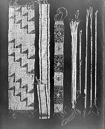 American Indians of eastern North America used wampum belts made from shell beads as money and gifts, and also to encode messages through the weaving of differently colored beads.