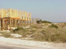 <img typeof="foaf:Image" src="http://statelibrarync.org/learnnc/sites/default/files/images/hurricane_construction.jpg" width="1024" height="768" alt="Hurricane resistant construction" title="Hurricane resistant construction" />