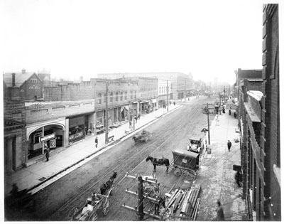 "Wilmington Street business district, looking south, elevated view, Raleigh, NC, c.1915." From Carolina Power and Light (CP&L) Photograph Collection (Ph.C.68), North Carolina State Archives; call #: PhC68_1_126.