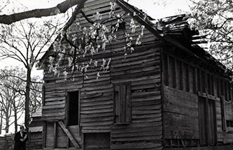 The Charles B. Aycock Birthplace barn before restoration, 1954. Image from the North Carolina Museum of History.