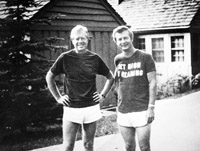 Black and white photo of James Baxter Hunt, Jr. and Jimmy Carter wearing running shorts and tshirts.