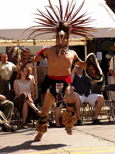 Aztec Dancer as Lexington Avenue Arts Fun Festival. Asheville, NC. Image courtesy of Flickr user Zen Sutherland. 