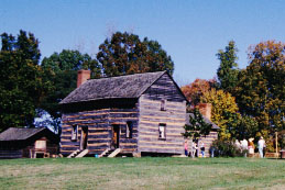 "Reconstructed log cabin similar to one young James K. Polk lived in at the Pres. James K. Polk State Historic Site near Pineville." Image courtesy of the James Polk NC Historic Site. 