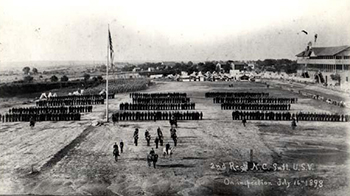 The Second North Carolina Infantry on inspection, July 16th 1898, at the racetrack of the State Fairgrounds. Image from the North Carolina Museum of History.