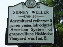 Sidney Weller's marker on SR 1002 east of Hollister at Medoc Mountain State Park in Halifax County. Photo is courtesy of North Carolina Highway Historical Marker Program.