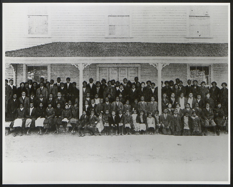 Group photograph of students and employees of Palmer Institute in front of Memorial Hall