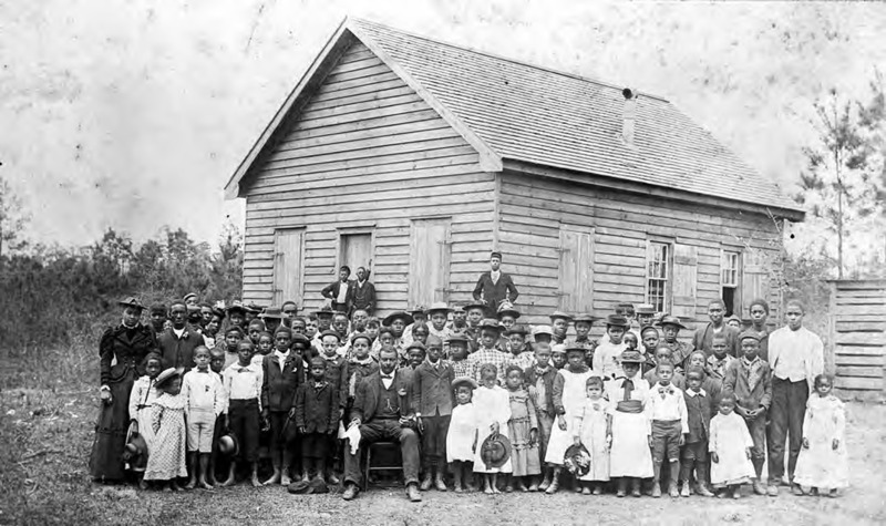 Professor Jacob's School, African-American, students and teacher in front of school, early 1900's, Lake Waccamaw, NC, Columbus County. From the General Negative Collection, North Carolina State Archives, Raleigh, NC.