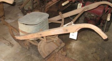 A seed planter made by Cole Manufacturing Company, 1920-1940. Image courtesy of North Carolina Museum of History. 