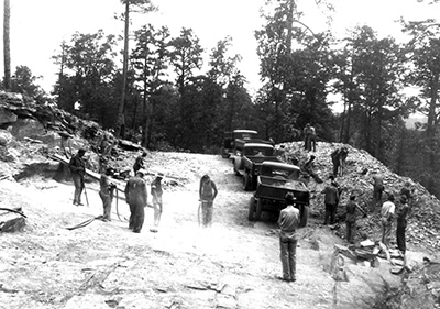 Workers in the Civilian Conservation Corps at the rock quarry during dam construction, ca. 1935-1942, at Hanging Rock State Park. Image from the collection of North Carolina State Parks.