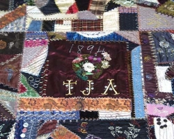 Closeup of portion of crazy quilt, made by Annie Durham Armstrong, ca.1894, Pender County, N.C. From the collections of the North Carolina Museum of History, courtesy of the North Carolina Department of Cultural Resources. 