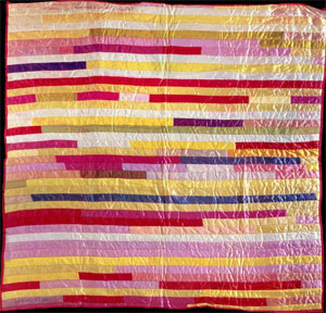 Funeral ribbon quilt, made from the ribbons from the funeral of Margaret Irene Wicker in 1958, Lee County, N.C. From the collections of the North Carolina Museum of History, used courtesy of the North Carolina Department of Cultural Resources. 