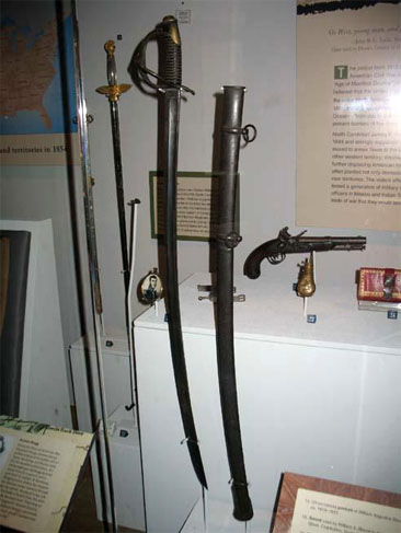 U.S. Heavy Cavalry Saber (Dragoon) (center).  Used by Gideon Sinclair under the command of J.E.B. Stuart during the Civil War. Item H.1978.36.1, from the collections of the North Carolina Museum of History. Used courtesy of the North Carolina Department of Cultural Resources. 