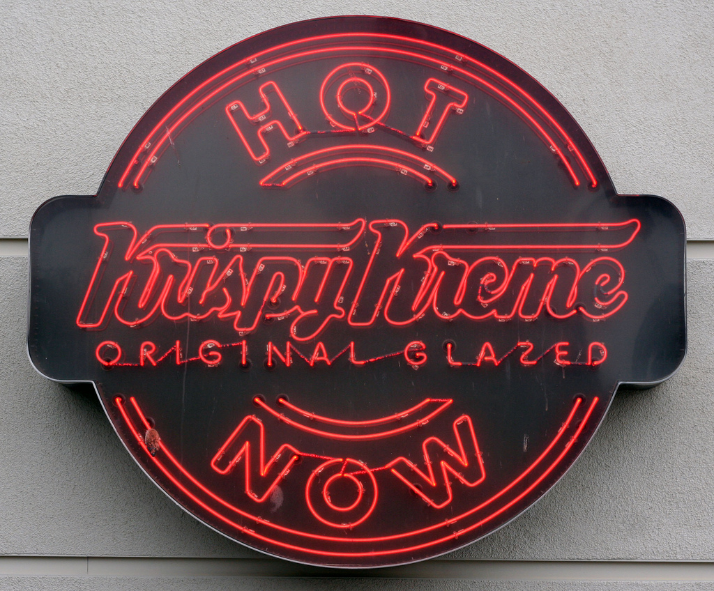 Krispy Kreme sign promoting "Hot and Ready" doughnuts.