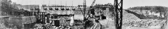 Construction of the Narrows Dam and powerhouse on the Yadkin River near Badin, a project of the Aluminum Company of America, 1917. North Carolina Collection, University of North Carolina at Chapel Hill Library.