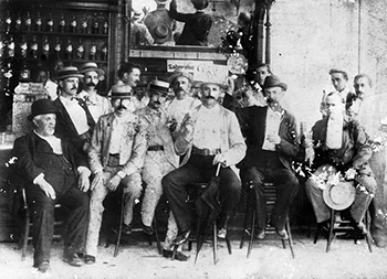 A group of men enjoying "Brad's Drink" in Bradham's Pharmacy in 1896. Image from the North Carolina Museum of History.