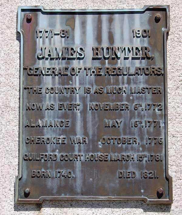 Photograph of plaque dedicated to James Hunter on the Hunter Monument at the Alamance County Battleground, Burlington, NC. Item #S.HS.2008.45.1, from North Carolina Historic Sites, North Carolina Department of Cultural Resources.  The Hunter Monument was originally located at Guilford Battle Ground in Greensboro, NC and subsquenetly relocated to the Alamance County battlefield, site of the Regulator defeat in 1771.     