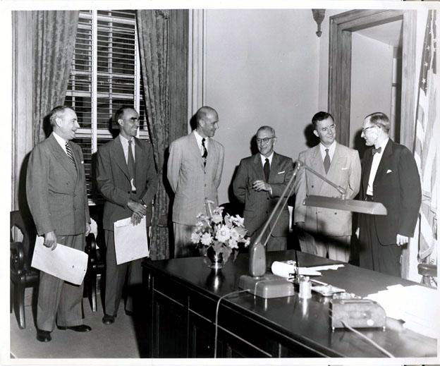 A photograph, circa 1953-1954 of (left to right): Paul A. Reid, Hugh T. Lefler, Christopher C. Crittenden, William T. Polk , James A. Stenhouse, and William B. Umstead. Image from the North Carolina Museum of History.
