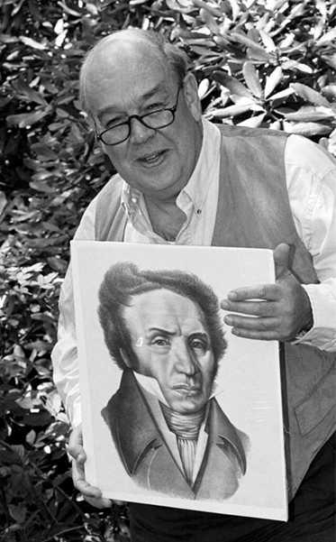 A photograph of television personality Charles Kuralt holding a portrait of Andre Michaux, May 28, 1994. Image from the North Carolina Collection Photographic Archives, University of North Carolina at Chapel Hill.
