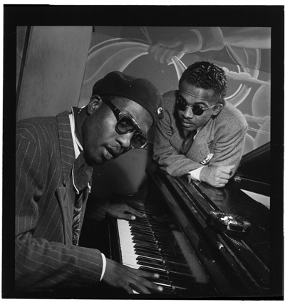 Portrait of Thelonious Monk and Howard McGhee, Minton's Playhouse, New York, N.Y., ca. Sept. 1947, by William P Gottlieb. Item LC-GLB23-0625 DLC from the William P. Gottlieb Collection, Library of Congress. The image was dedicated to the public domain by William P. Gottlieb. 