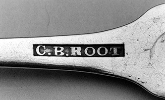 The makers mark of silversmith Charles Boudinot Root on the back of a teaspoon, circa 1843-1860. Image from the North Carolina Museum of History.