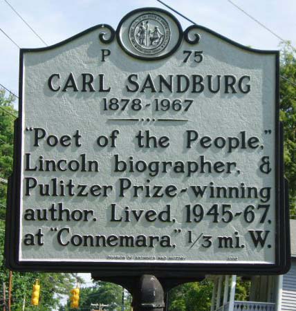Carl August Sandburg's marker is located on Little River Road in Flat Rock in Henderson County.  Photo is courtsey from the North Carolina Highway Historical Marker Program.