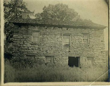 Photograph of Adam Spach's "Rock House" in Forsyth County, built by Adam Spach circa 1774, image taken circa 1900-1920.  Item H.1946.14.223  from the collections of the North Carolina Museum of History.  William Elias Spach was a descendent of Adam Spach. 