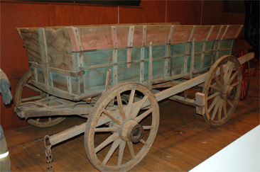 Photograph of farm wagon, attributed to Spach Wagon Works, made circa 1880-1900.  Item S.1986.29.1 from North Carolina Historic Sites, North Carolina Department of Cultural Resources. 