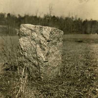  A piece of stone off the side of the road.