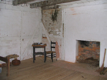 The interior of the slave house. These houses have "nogging" or brick insulation