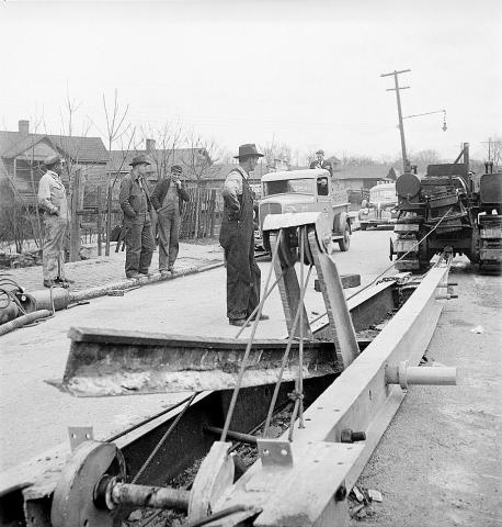 Buried trolley tracks salvaged to aid war program