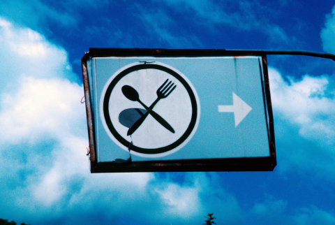 Restaurant sign showing crossed fork and spoon