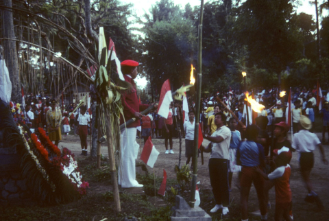 Lighting torches Independence Day Aug 17, '86