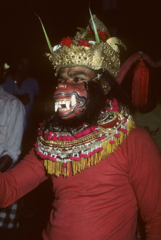 Balinese masked dancer costumed as Sugriva the red monkey king